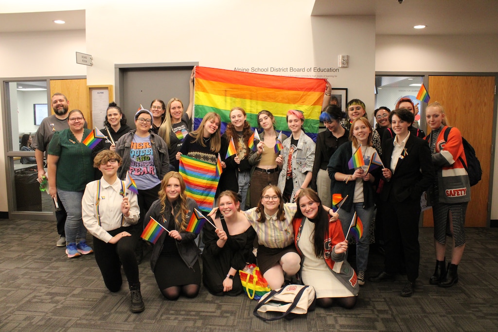 (Sarah Hunt | Daily Herald) A group of LGBTQ students and supporters pose for a photo at the Alpine School District office in American Fork on Tuesday, March 28, 2023. 