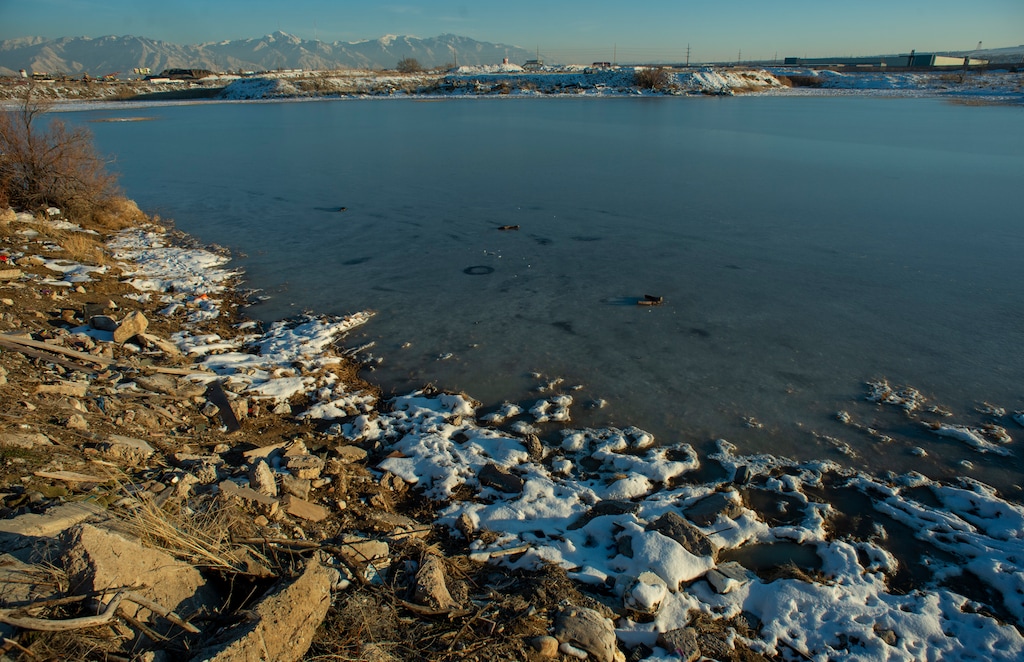 (Rick Egan  |  The Salt Lake Tribune)     The Utah Department of Environmental Quality, with the help of local authorities, has removed tires and garbage that were illegally dumped on the banks of Lee Kay Ponds Wednesday, Jan. 2, 2019. Last August, jail inmates hauled nearly 4,000 tires from these wetlands west of Salt Lake City, which have long been misused as convenience dumping ground by those trying to avoid tipping fees at the nearby landfills.