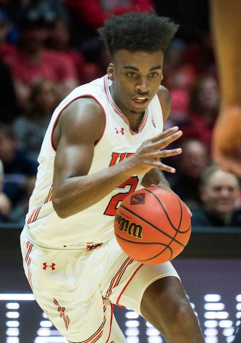 (Rick Egan  |  The Salt Lake Tribune)    Utah guard Kolbe Caldwell (2) brings the ball down court for the Utes, in NIT playoff action between Utah Utes and LSU Tigers at the Jon M. Huntsman Center, Monday, March 19, 2018.