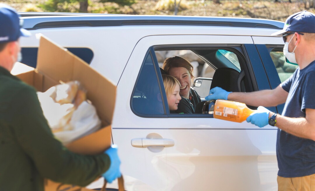 (Leah Hogsten  |  The Salt Lake Tribune)  Snowbird employees handed out over 10,000 pounds of perishable items from the ski resort's restaurants and stores to their workforce, March 21, 2020. The food included milk, eggs, bread, cheeses, every kind of herb, vegetable and fruit, including kumquats and lemon grass, and was given to Snowbird employees on a first-come, first-served basis.