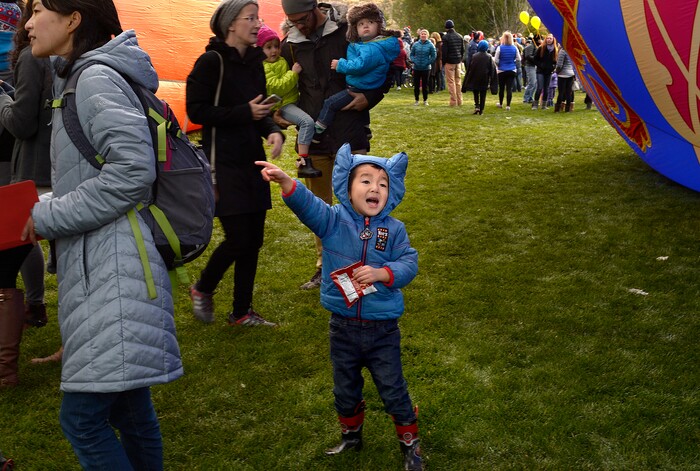 (Scott Sommerdorf | The Salt Lake Tribune)
A young balloon spectator gets excited as the balloons begin to launch at the 4th annual Autumn Aloft Hot Air Balloon Festival in Park City, Sunday, September 17, 2017.