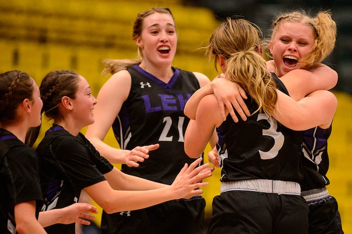 (Trent Nelson | The Salt Lake Tribune)
Lehi vs. Desert Hills, 4A State high school basketball tournament at Utah Valley University in Orem, Thursday March 1, 2018. Lehi's Mikayla Mineer (44) embraces Lehi's Alli Butterfield (3) as the team comes from behind to tie the score going into halftime.