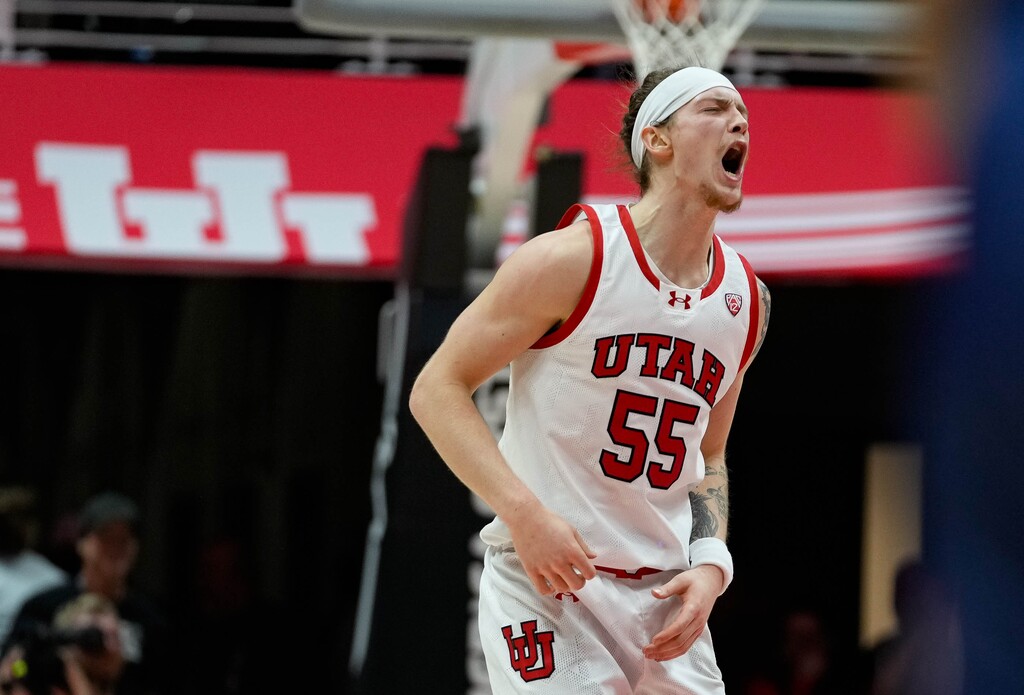 (Francisco Kjolseth | The Salt Lake Tribune) Utah Utes guard Gabe Madsen (55) screams in celebration forcing the first of three overtimes in PAC-12 basketball action between the Utah Utes and the Arizona Wildcats at the Jon M. Huntsman Center, on Thursday, Feb. 8, 2024.