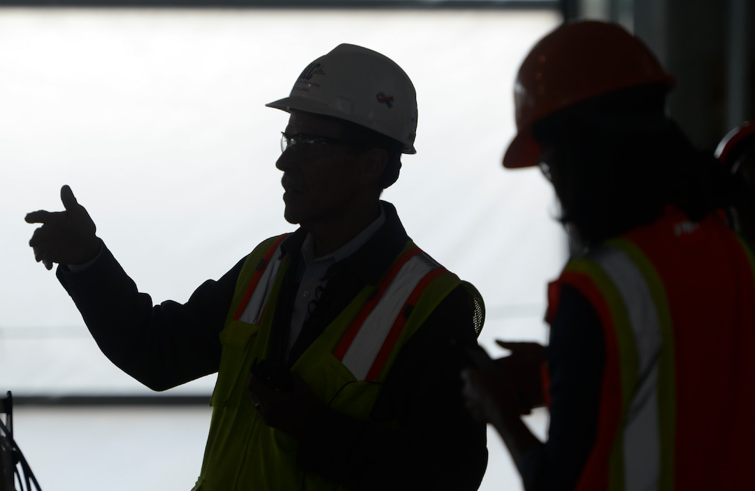Leah Hogsten  |  The Salt Lake Tribune Mike Williams, airport redevelopment project manager, leads members of the media on a tour of the airport expansion construction site, Monday, Oct. 22, 2018. The first phase construction of the $3.6 billion project is due to open in 700 days. Nearing completion is the new concourse for aircraft gates, an enclosed terminal, the steel skeleton of a new "gateway" building, a five-story parking garage and elevated roadways. 