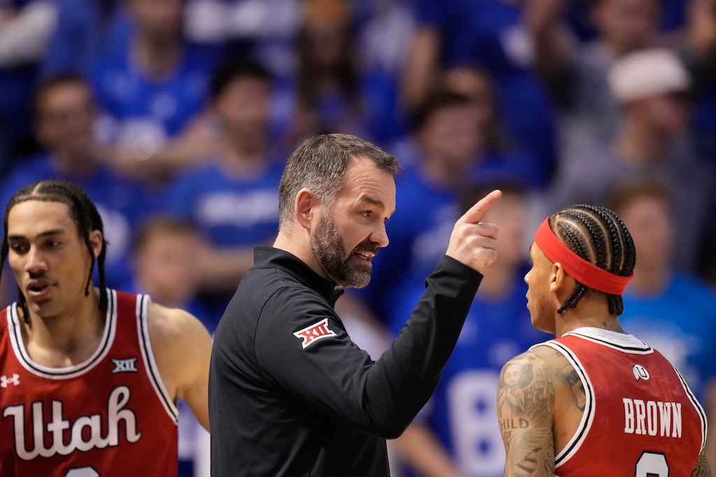 (Francisco Kjolseth | The Salt Lake Tribune) Utah men's basketball head coach Alex Jensen guides his team as BYU hosts Utah, NCAA basketball in Provo on Saturday, Jan. 24, 2026.