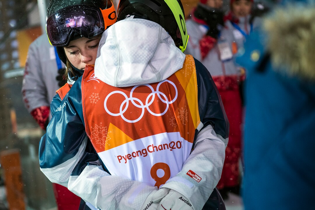 (Chris Detrick  |  The Salt Lake Tribune)  Park City's Jaelin Kauf hugs fellow Park City moguls athlete Keaton McCargo after competing the Ladies' Moguls Final at Phoenix Park during the Pyeongchang 2018 Winter Olympics Sunday, February 11, 2018. Kauf finished seventh with a score of 76.03. McCargo finished  in eighth place with a score of 75.79. 