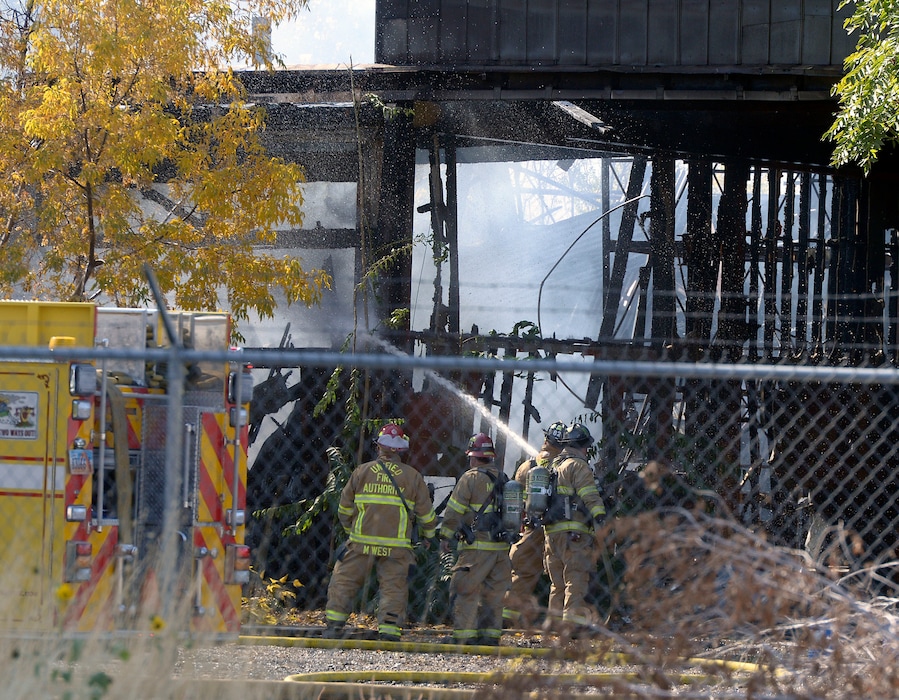 (Al Hartmann  |  The Salt Lake Tribune) Murray Fire Dept. fights fire at 4500 S. and 200 W. Thursday Oct 12.