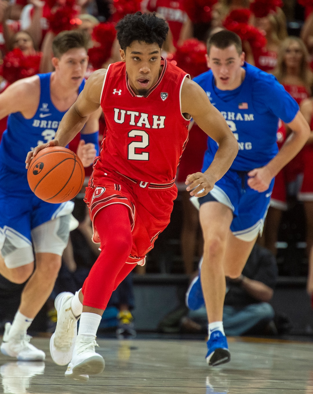 (Rick Egan  |  The Salt Lake Tribune)   Utah Utes guard Sedrick Barefield (2) leads a fast break, in basketball action in the Beehive Classic, between against the Brigham Young Cougars and Utah Utes, at the Vivint Smart Home Arena, Saturday December 8, 2018.