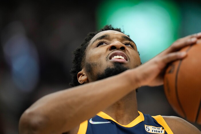 (Francisco Kjolseth | The Salt Lake Tribune) Utah Jazz guard Donovan Mitchell (45) spots his large in NBA action between the Utah Jazz and the Minnesota Timberwolves at Vivint Smart Home Arena in Salt Lake City, Thursday, Dec. 23, 2021.