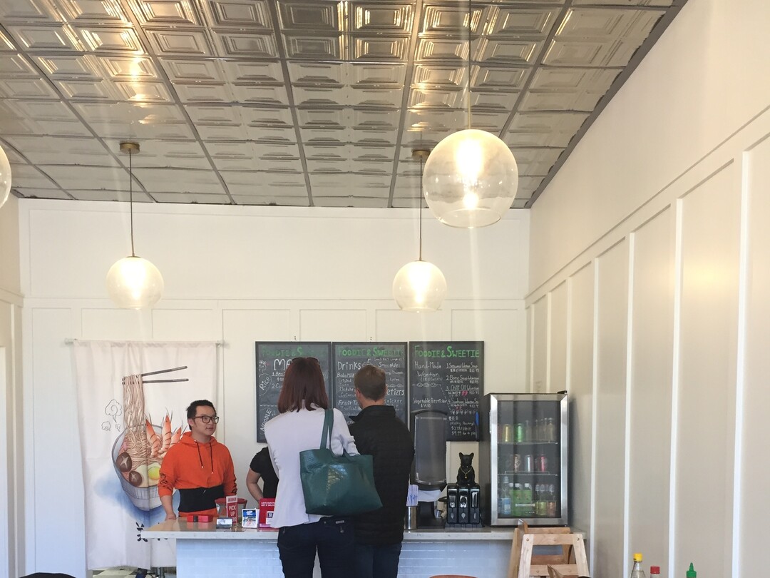 (Kathy Stephenson | The Salt Lake Tribune) Customers order at the counter inside Salt Lake City's Foodie & Sweetie D Market.