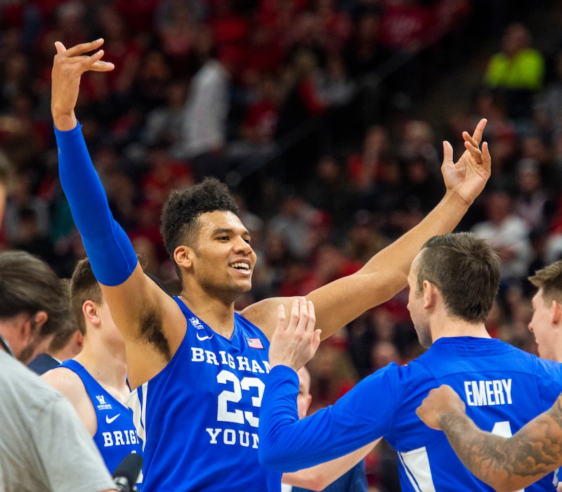 (Rick Egan  |  The Salt Lake Tribune)   Brigham Young forward Yoeli Childs (23) reacts as the Cougars take a 17 point lead with 3 minutes left, in basketball action in the Beehive Classic, between against the Brigham Young Cougars and Utah Utes, a the Vivint Smart Home Arena, Saturday December 8, 2018.