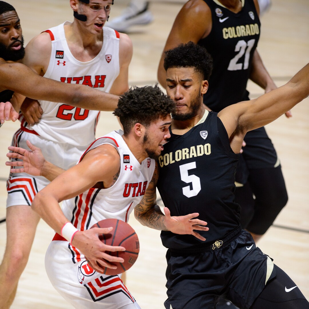 (Trent Nelson  |  The Salt Lake Tribune) Utah Utes forward Timmy Allen (1) drives on Colorado Buffaloes guard D'Shawn Schwartz (5) as Utah hosts Colorado, NCAA basketball in Salt Lake City on Monday, Jan. 11, 2021.