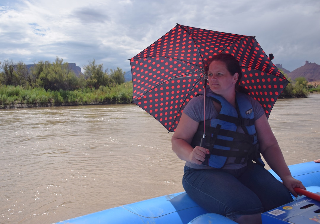 (Shannon Mullane for High Country News)  Heidi Foster takes a brief break during a July 27, 2019, rafting trip. Foster has advocated for more lenient polygamy laws with Utah legislators. She is also the mother of Jessica Christensen, star of the reality show, "Escaping Polygamy."