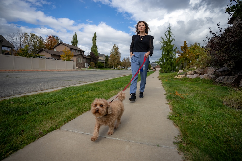 (Trent Nelson | The Salt Lake Tribune) Nancy Sylvester walks her dog Mikey in Syracuse on Friday, Oct. 23, 2026.