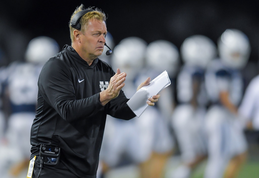 (Eli Lucero | Herald Tribune) Utah State head coach Bronco Mendenhall claps after the Aggies scored a touchdown against Air Force in the second half Saturday Sept. 13, 2025, in Logan.
