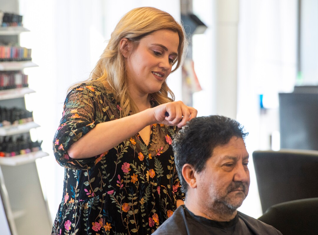 (Rick Egan  |  The Salt Lake Tribune)     Alyssa Brown styles Edward Santillanes hair at Mid City Salon, Saturday, March 21, 2020.