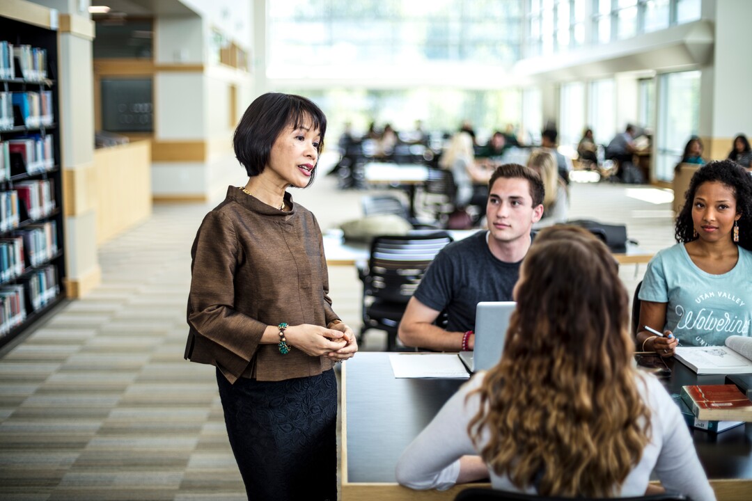 (Photo Courtesy of Jay Drowns/Utah Valley University) Utah Valley University President Astrid S. Tuminez is photographed with students on the UVU campus in Orem, Utah on Wednesday, June 1, 2018.
