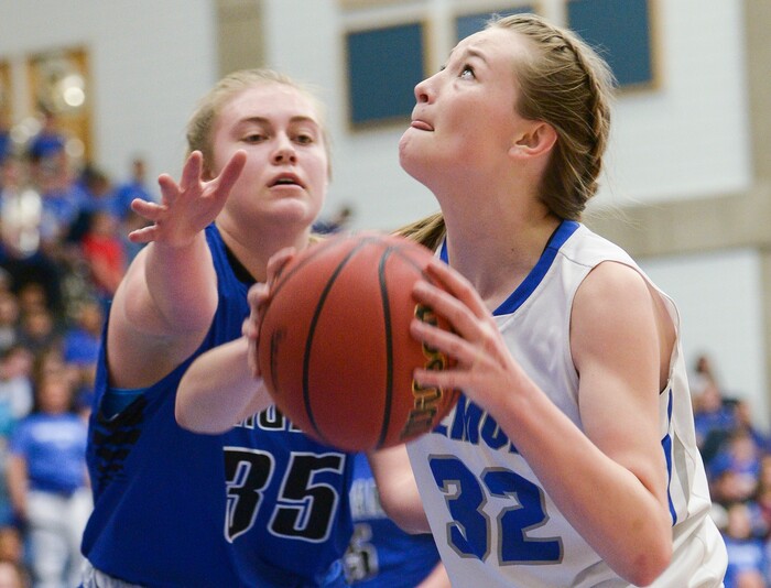 (Leah Hogsten  |  The Salt Lake Tribune) Fremont's Haylee Doxey (32) looks to the net under pressure from Bingham's Jaycee Lichtie (35). Fremont defeated Bingham 61-47 to win the 6A High School Girls' Basketball Tournament title at SLCC in Taylorsville,Saturday, Feb. 24, 2018. 