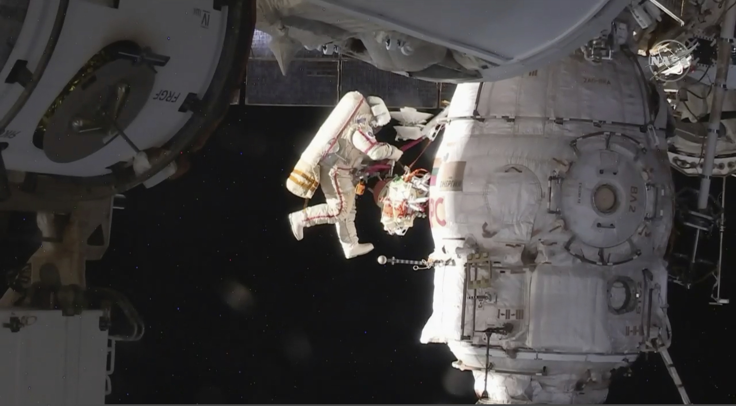 (NASA | The Associated Press) In this image from video made available by NASA, Russian cosmonaut Oleg Kononenko performs a spacewalk outside the International Space Station on Tuesday, Dec. 11, 2018. Kononenko and Sergei Prokopyev are inspecting a section where a mysterious leak appeared on Aug. 30.