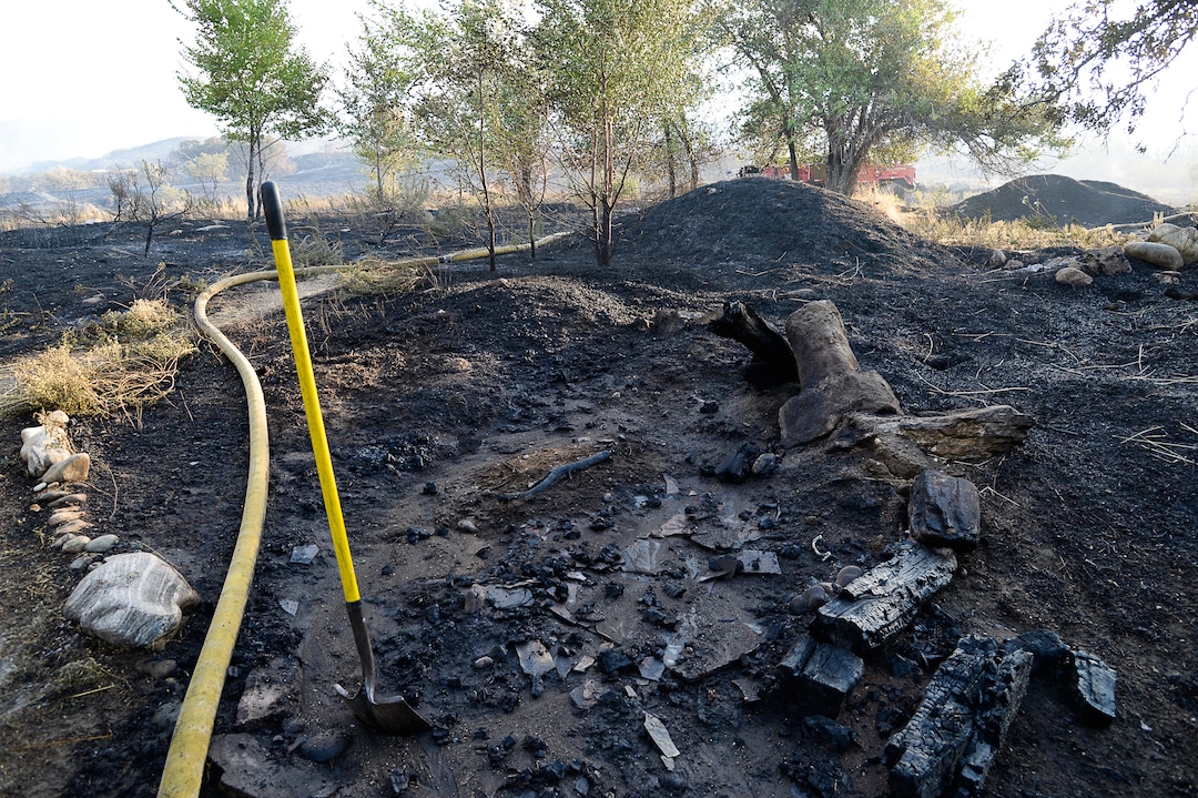 (Francisco Kjolseth  |  The Salt Lake Tribune)  Fire Crews battle a fire in Davis County in Utah on the East Bountiful bench that grew to 150 acres early Friday morning, Aug. 30, 2019, and destroyed three homes. On Sept. 2, officials said the fire was 100% contained.