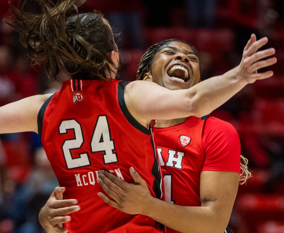 (Rick Egan | The Salt Lake Tribune) Utah Utes guard Kennady McQueen (24) and Utah forward Dasia Young (34) celebrate the Utes 84-78 win over the Stanford Cardinals, in PAC-12 action, at the Jon M. Huntsman Center, on Saturday, Feb. 25, 2023.