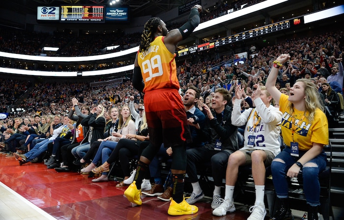 (Francisco Kjolseth  |  The Salt Lake Tribune)  Utah Jazz forward Jae Crowder (99) nearly ends up in the stands going after a ball as the Utah Jazz host the Denver Nuggets in their NBA game at Vivint Smart Home Arena Tuesday, April 9, 2019, in Salt Lake City.