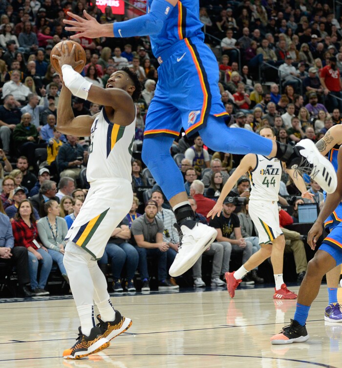 (Francisco Kjolseth  |  The Salt Lake Tribune)  Utah Jazz guard Donovan Mitchell (45) faces big man Oklahoma City Thunder center Steven Adams (12) as the Utah Jazz host the Oklahoma City Thunder in their NBA basketball game at Vivint Smart Home Arena in Salt Lake City on Mon. Dec. 9, 2019.