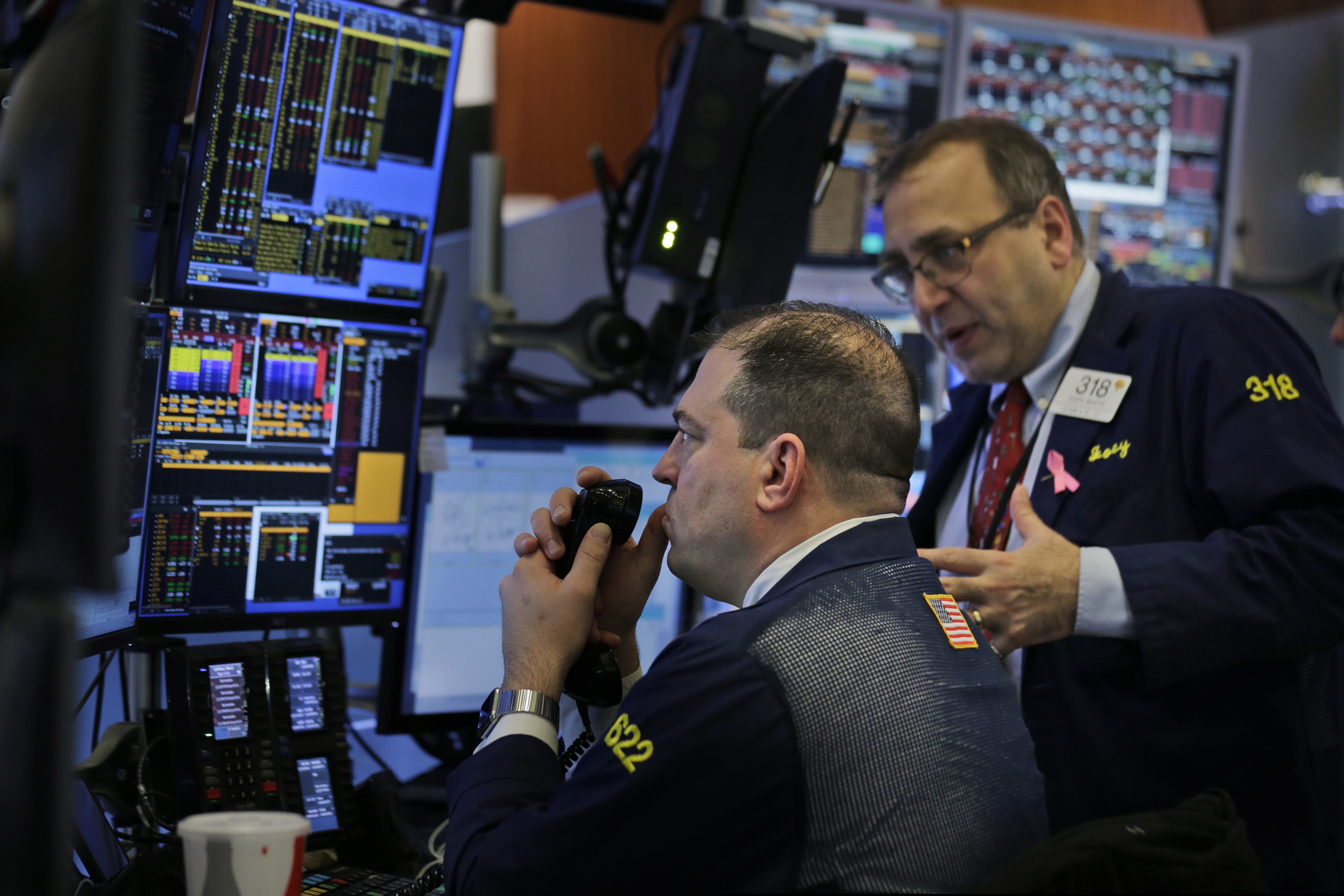 Traders work on the floor of the New York Stock Exchange in New York, Monday, Dec. 24, 2018. (AP Photo/Seth Wenig)
