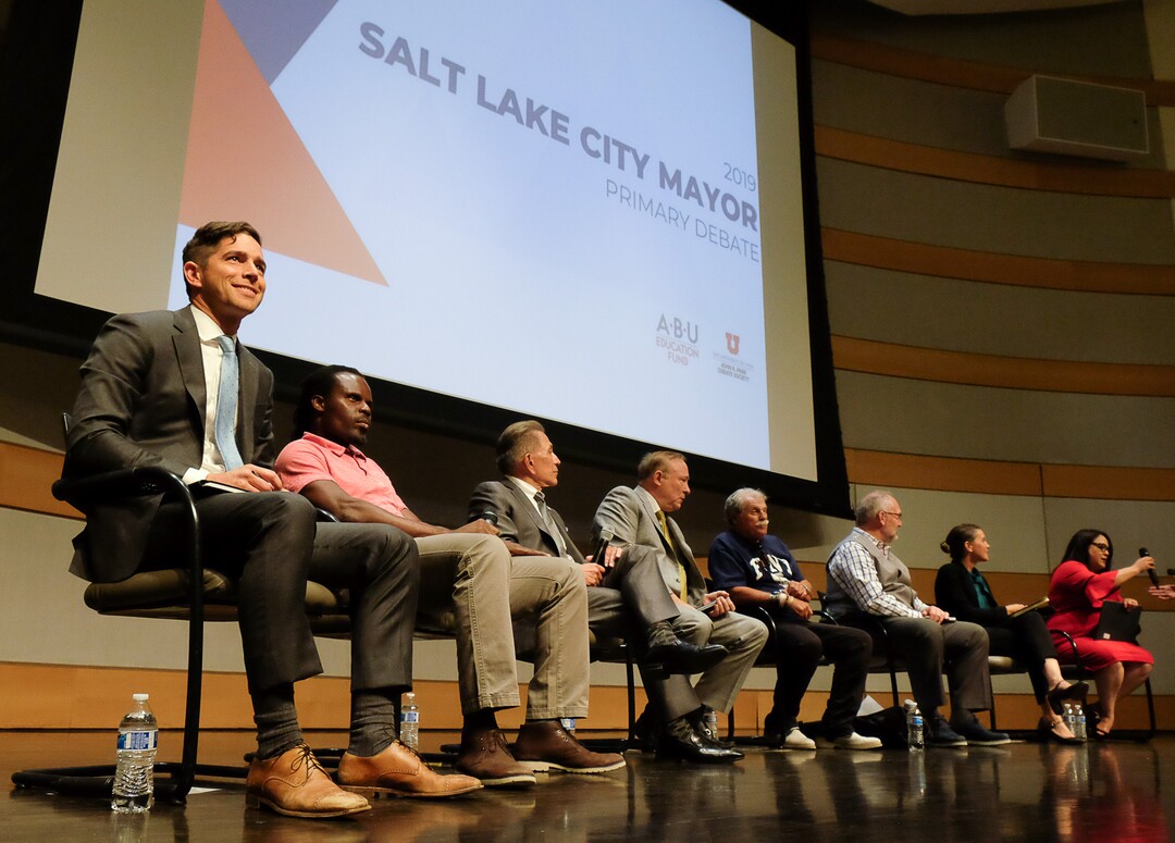 (Francisco Kjolseth  |  The Salt Lake Tribune)  All eight of the candidates for Salt Lake City mayor gather for a debate at the Salt Lake City Library on Wed. June 26, 2019, which includes, from left, David Garbett, Abi Olufeko standing in for Rainer Huck, David Ibarra, Jim Dabakis, Richard Goldberger, Stan Penfold, Erin Mendenhall and Luz Escamilla. The debate was hosted by the ABU Education Fund and the University of Utah’s John R. Park Debate Society and moderated by Averie Vockel.