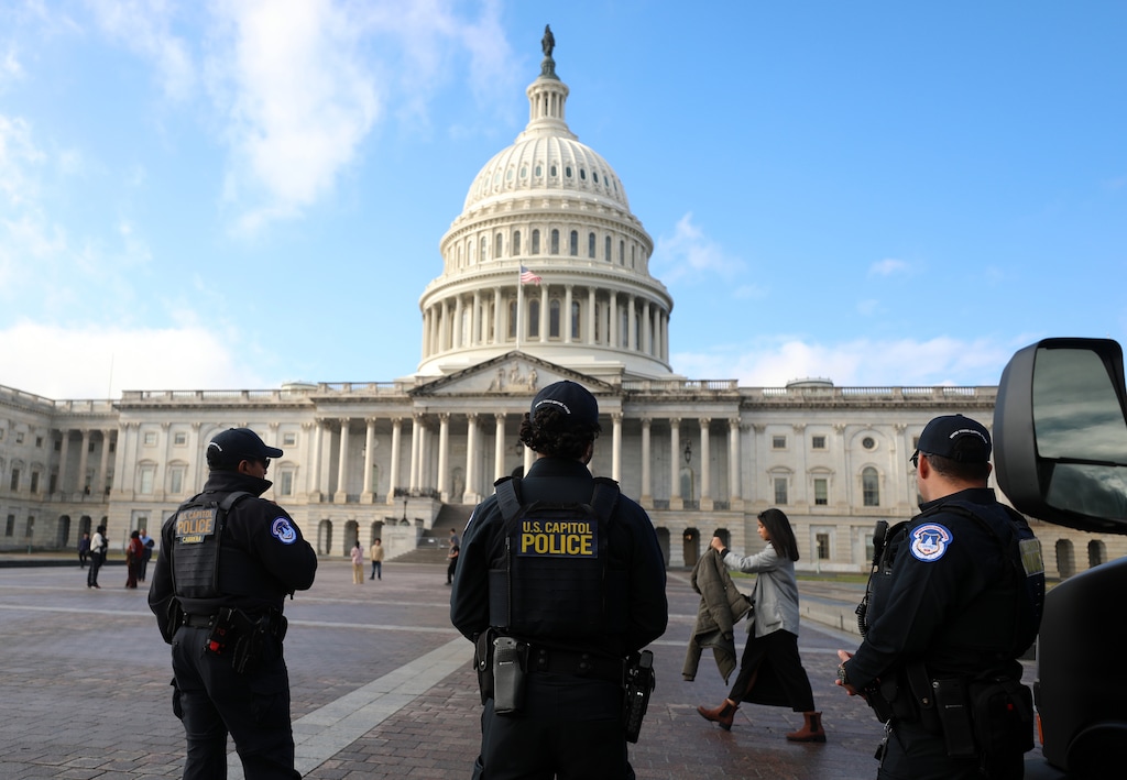 Capitol Police officers stand guard on the East Front of the U.S. Capitol, Wednesday, Nov. 26, 2025, in Washington. (AP Photo/Rahmat Gul)