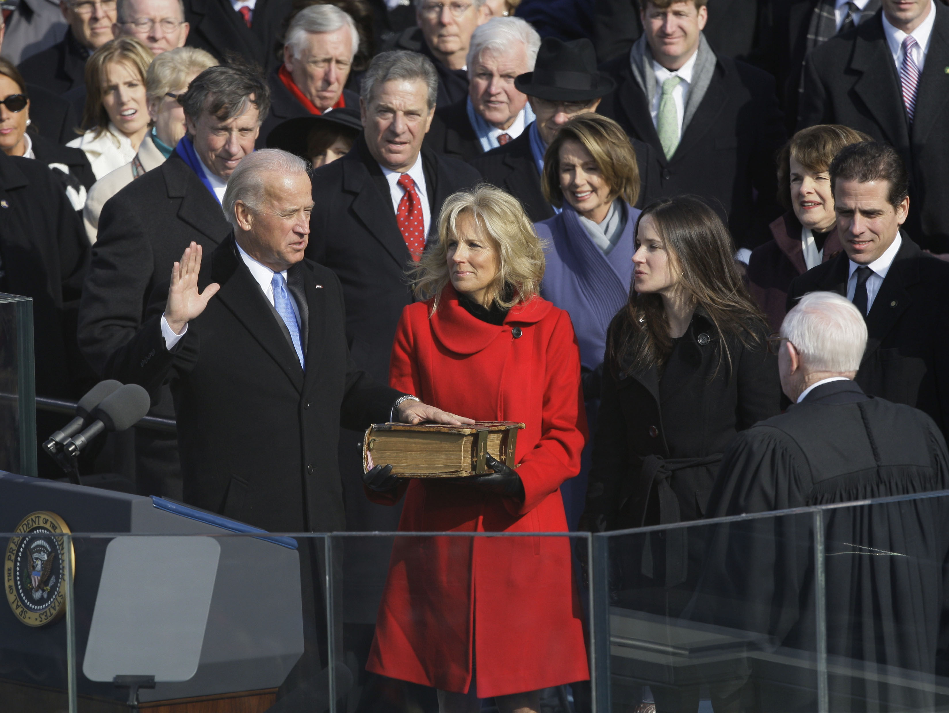 (Elise Amendola | AP file photo)

In this Jan. 20, 2009, photo, Vice President-elect Joe Biden takes the oath of office from Justice John Paul Stevens as his wife, Jill Biden, holds the Bible at the U.S. Capitol in Washington.