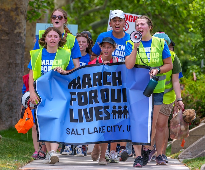 (Leah Hogsten | The Salt Lake Tribune) Hundreds of Utahns marched from West High School to the Capitol, Saturday, June 11, 2022, during the March For Our Lives SLC event. The march is in response to the most recent shootings in Uvalde, Buffalo and Tulsa to demand action from Utah legislators and congressmen to enact gun safety laws.