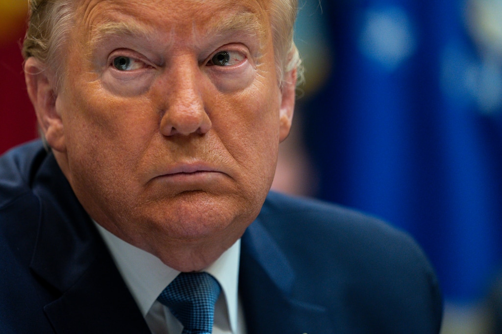 President Donald Trump listens during a meeting on the Coronavirus with health care company leaders, in the Roosevelt Room of the White House, Tuesday, March 10, 2020, in Washington. (AP Photo/Evan Vucci)