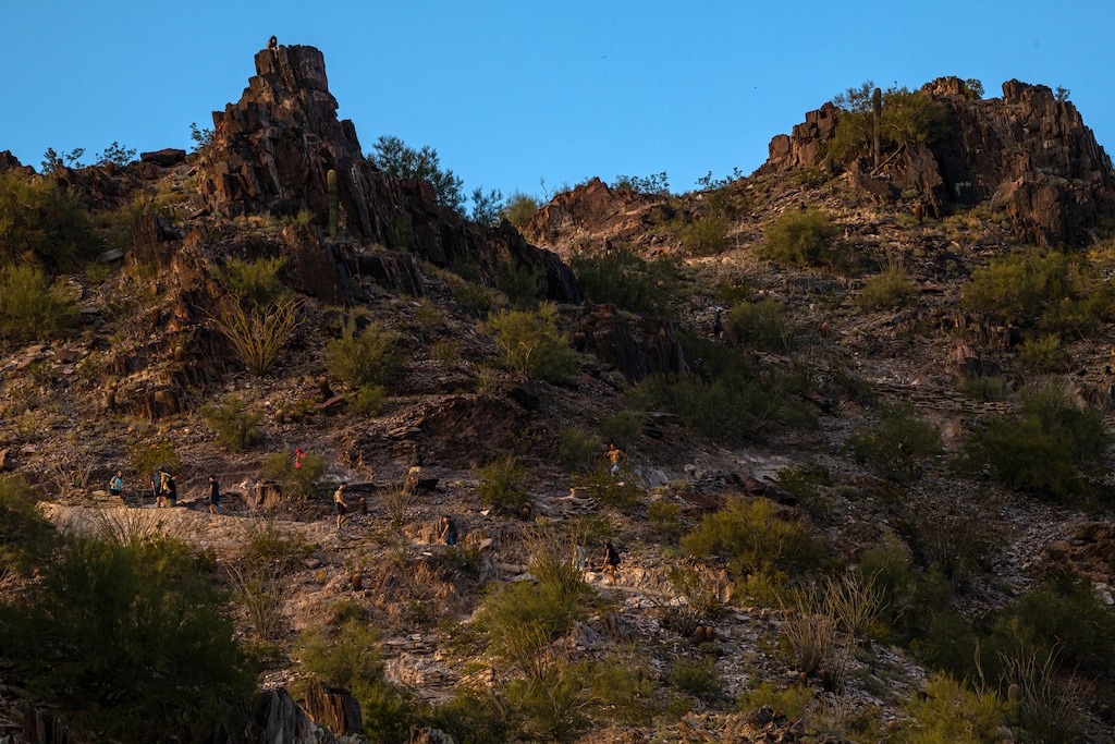 (Ash Ponders | The New York Times) Piestewa Peak in Phoenix, which was called Squaw Peak until a state panel in Arizona renamed it in 2003, is photographed on March 3, 2022. The Interior Department is looking to rename 660 federal sites that use the offensive term "squaw."