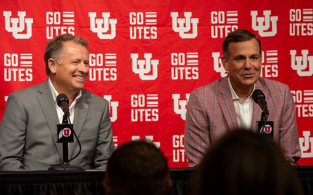 (Chris Samuels | The Salt Lake Tribune) University of Utah president Taylor Randall, left, and athletic director Mark Harlan hold a news conference at Rice-Eccles Stadium after announcing the school’s entrance to the Big 12 Conference, Monday, Aug. 7, 2023.