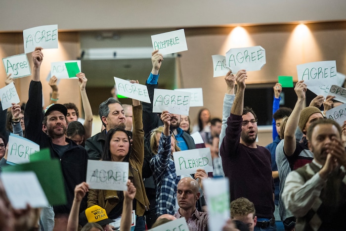 Chris Detrick  |  The Salt Lake Tribune
Members of the audience hold up signs as U.S. Rep. Jason Chaffetz, R-Utah, speaks during the town-hall meeting in Brighton High School Thursday February 9, 2017. 