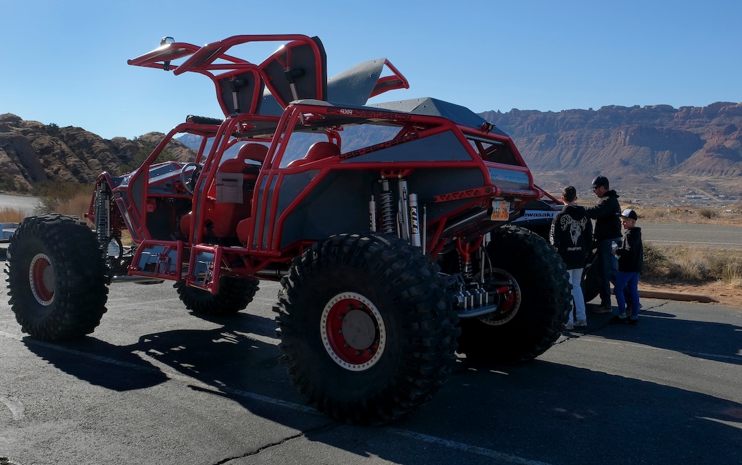(Leah Hogsten | The Salt Lake Tribune)  Friends of Joe Riley, owner of Epic 4x4 Adventures in Moab, prepare to take a ride in Riley's Mega Buggy to work on the Sand Flats Recreation Area trail Hell's Revenge for trail resortation and repairs, Feb. 20, 2021.