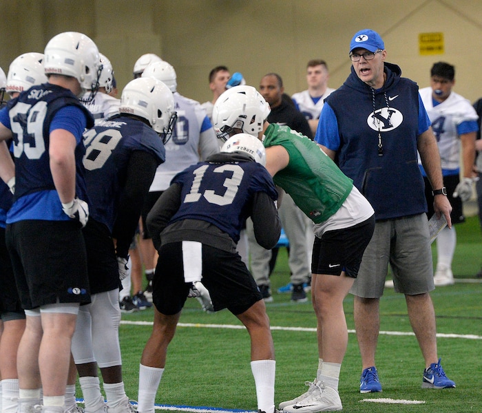 (Al Hartmann | The Salt Lake Tribune)
BYU opened spring football camp on Monday March 5 in the Indoor Playing facility with some new offensive coaching staff, like offensive coordinator Jeff Grimes, right.