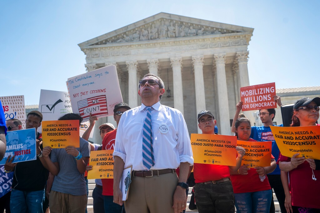 Gustavo Torres, executive director of CASA, an advocacy group for the immigrant community, sighs as the Supreme Court decision is announced in a census case involving an attempt by the Trump administration to ask everyone about their citizenship status in the 2020 census, on Capitol Hill in Washington, Thursday, June 27, 2019. (AP Photo/J. Scott Applewhite)