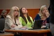 (Trent Nelson | The Salt Lake Tribune) Kouri Richins reacts as her brother, Ronney Darden, speaks on her behalf during her sentencing in 3rd District Court in Park City on May 13, 2026. At left is defense attorney Wendy Lewis and at right is defense attorney Kathy Nester.