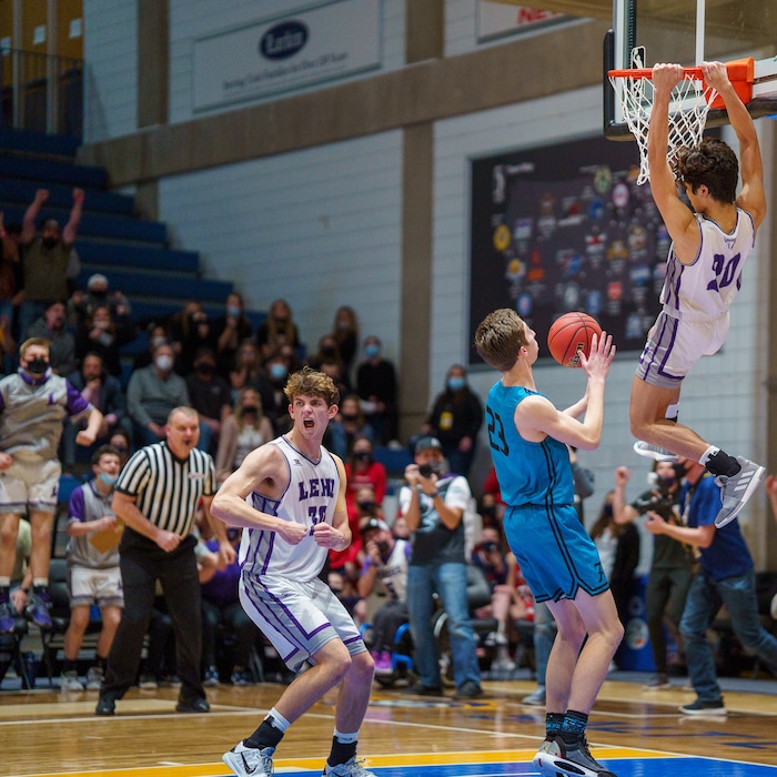 (Trent Nelson | The Salt Lake Tribune) Lehi's Peter Amakasu dunks the ball in the final minute as Lehi defeats Farmington High School in the 5A boys basketball state championship game, in Taylorsville on Saturday, March 6, 2021.