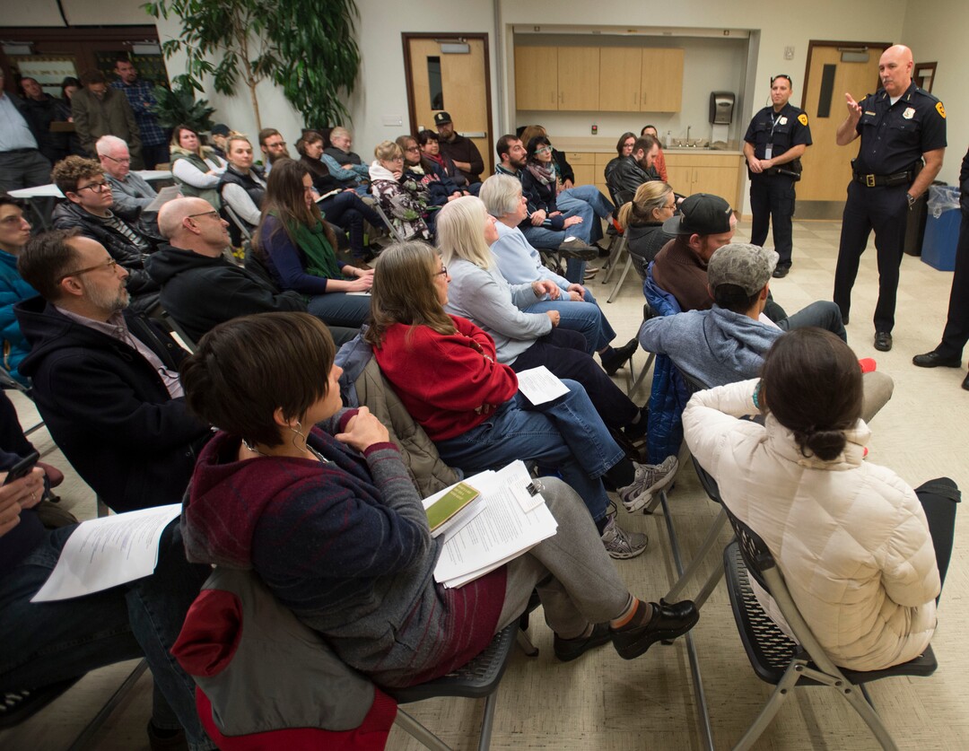 (Steve Griffin  | Tribune file photo)  Salt Lake City police chief Mike Brown talks with citizens about their concerns on the newly announced locations for the four new homeless shelters, one of which is in their neighborhood, during the Liberty Wells Community Council meeting at Tracy Aviary in Salt Lake City Wednesday December 14, 2016.