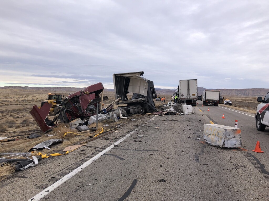 (Utah Department of Public Safety) Two truck drivers were killed Tuesday morning when one semitruck drifted into a lane of oncoming traffic in the early morning of Tuesday, December 14, 2021.