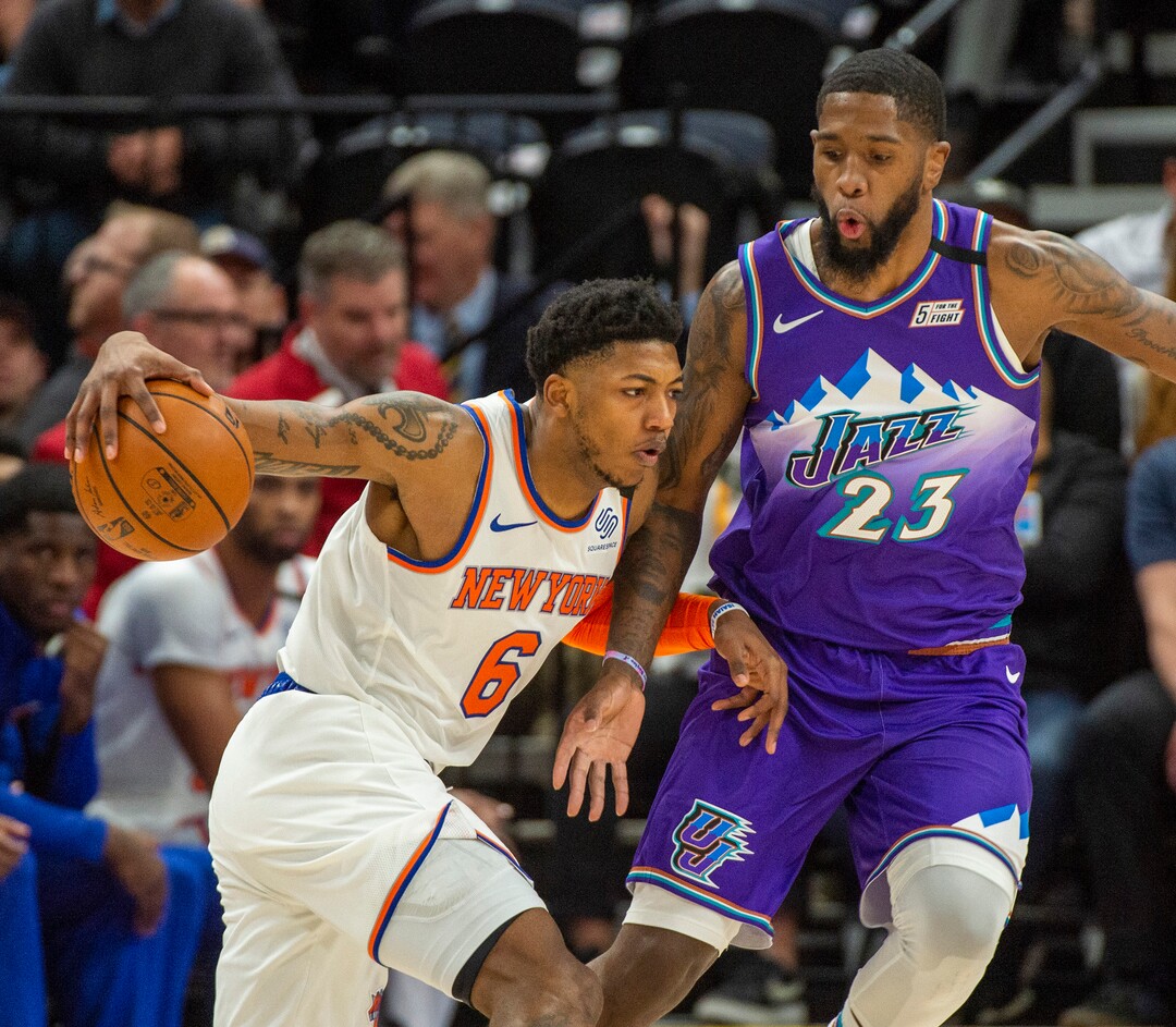 (Rick Egan  |  The Salt Lake Tribune) New York Knicks guard Elfrid Payton (6) drives as Utah Jazz forward Royce O'Neale (23) defends, in NBA action between the Utah Jazz and the New York Knicks, in Salt Lake City, Wednesday, Jan. 8, 2020.