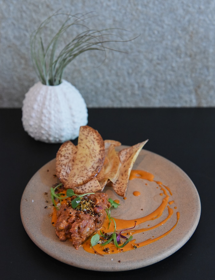 (Francisco Kjolseth  |  The Salt Lake Tribune)  Beef Tartare at the Post Office Place, a new bar by the same owners as Takashi, located next door, welcomes patrons on Tuesday, June 19, 2018. One of the main reasons Takashi and Tamara Gibo opened this downtown watering hole is so that their patrons could have a drink while waiting for a seat at Takashi where the wait can sometimes be an hour long and liquor laws don't allow cocktails unless you are seated.
