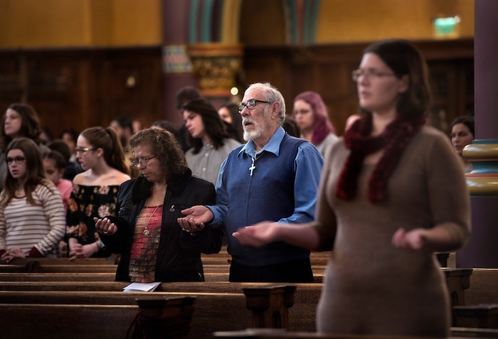 (Scott Sommerdorf   |  The Salt Lake Tribune)   Parishioners during the early morning Christmas Eve mass on the fourth Sunday of Advent at the Cathedral of the Madeleine, Sunday, December 24, 2017. 
