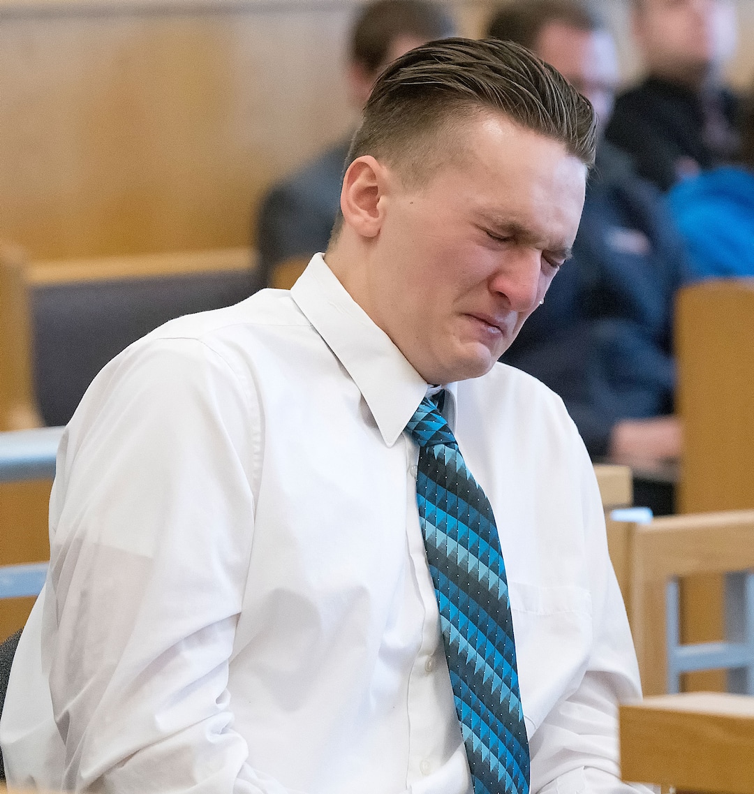 (Eli Lucero  |  Herald Journal, pool) Colter Peterson cries while listening to Deserae Turner speak during his sentencing hearing for attempted aggravated murder and robbery, Thursday, Feb. 1, 2018, in Logan, Utah. Peterson received a sentence of 15 years to life for shooting Deserae Turner in February 2017, and leaving her for dead in a dry irrigation canal in Smithfield, Utah.