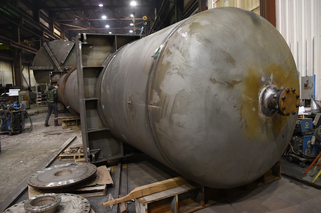 (Francisco Kjolseth  |  The Salt Lake Tribune)  Brandon Sortor, Director of Business Development of Structural Steel and Plate Fabrication in North Salt Lake, overlooks a large air tank that will be used to power a ride at a Six Flags amusement park in Chicago. Recent metal tariffs have proven challenging for the company due to material availability forcing the company to pay a premium. 