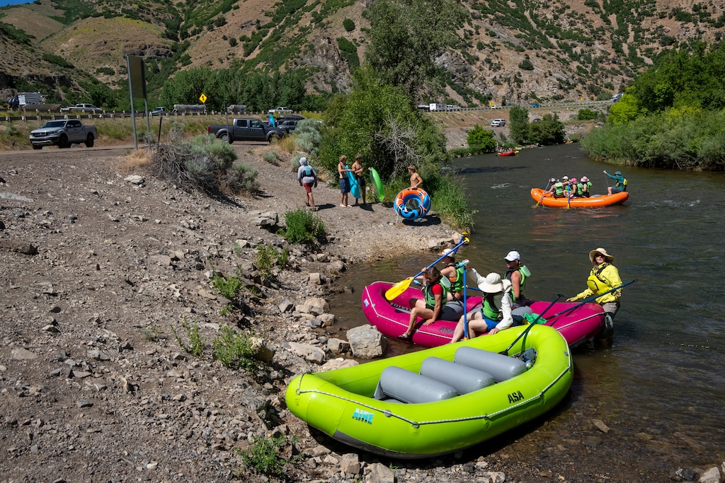 (Rick Egan | The Salt Lake Tribune)  Rafters leave their rafts at the Taggart takeout point of the Hen-Tag section of the Weber River, on Friday, June 21, 2024.