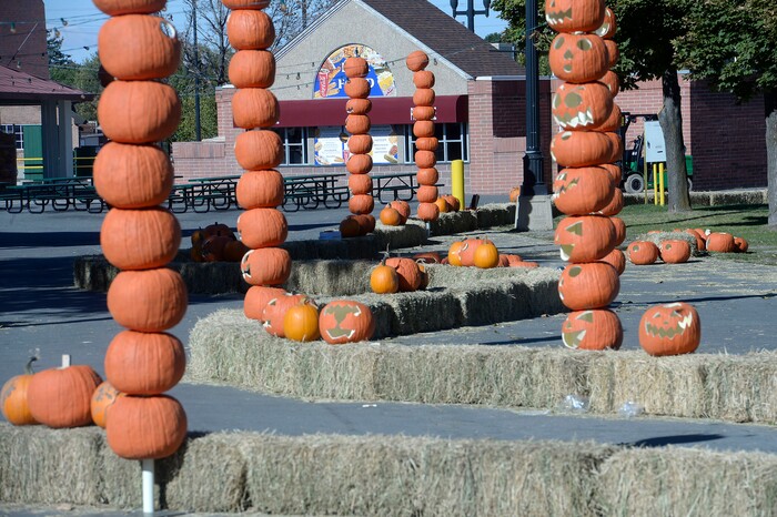 (Al Hartmann  |  The Salt Lake Tribune) 	Straw bales and pumpkins form a walkway at Salt Lake City’s new event, Pumpkin Nights, an outdoor, family-friendly Halloween walkthrough with ten immersive lands created with more than 3,000 hand-carved pumpkins. It will be open for 17 days—kicking off on Friday, Oct. 13 through Sunday, Oct. 29 at the Utah State Fairpark.